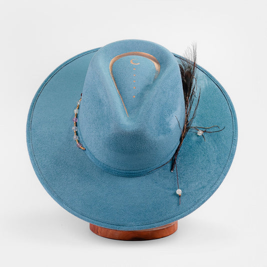 Aukala Hat M Handcrafted Boho Nahual Celeste Hat – Teal Suede Fedora with Gold Moon, Peacock Feather & Beaded Details