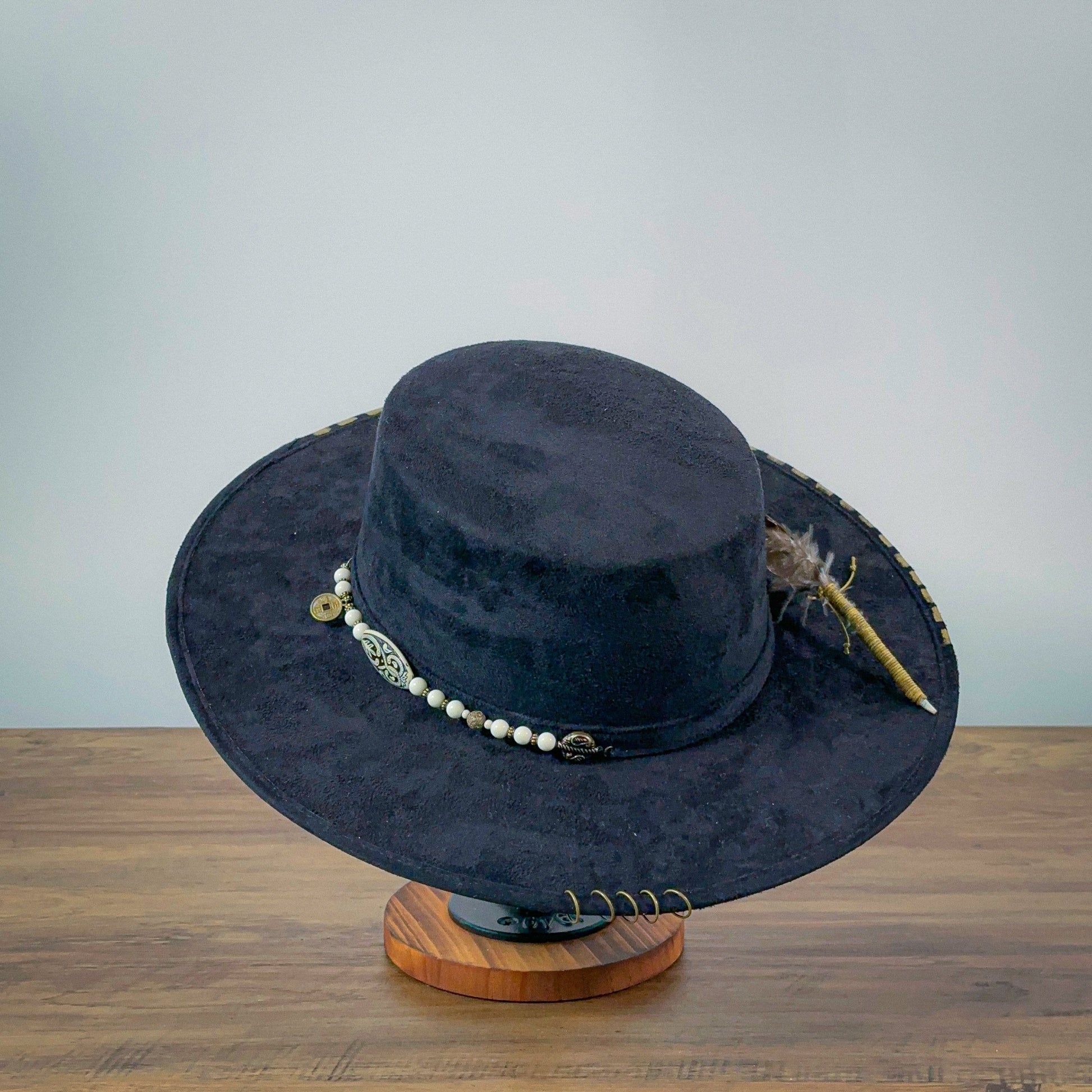 Aukala M Eco-Chic Elegance: Black Suede Hat with Artistic Gold