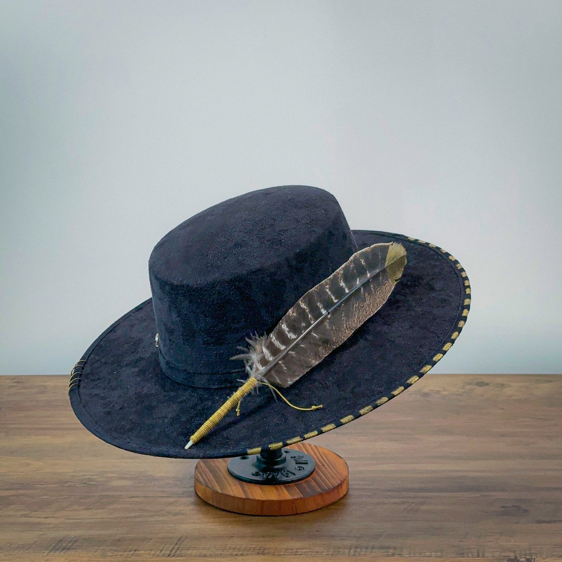 Aukala M Eco-Chic Elegance: Black Suede Hat with Artistic Gold